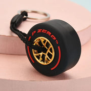 Luxury Mini F1 Racing Tire Keychain – Car Key Accessory & Gift for Car Lovers