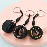 Luxury Mini F1 Racing Tire Keychain – Car Key Accessory & Gift for Car Lovers